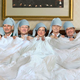 The nine Supreme Court justices, all cozy and warm in their big bed.